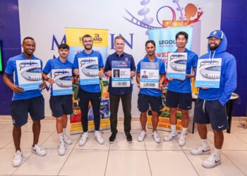 Players of Johor Darul Ta'zim F.C. showcase the special edition “Southern Tigers” LEGOLAND annual pass.